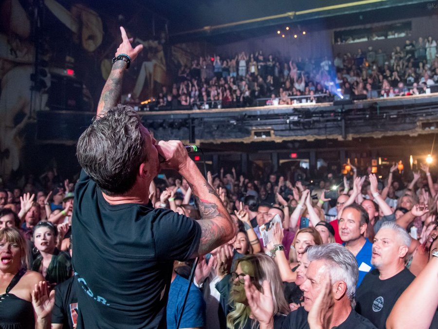 Vocalist facing a packed Fonda Theatre crowd during the annual benefit concert