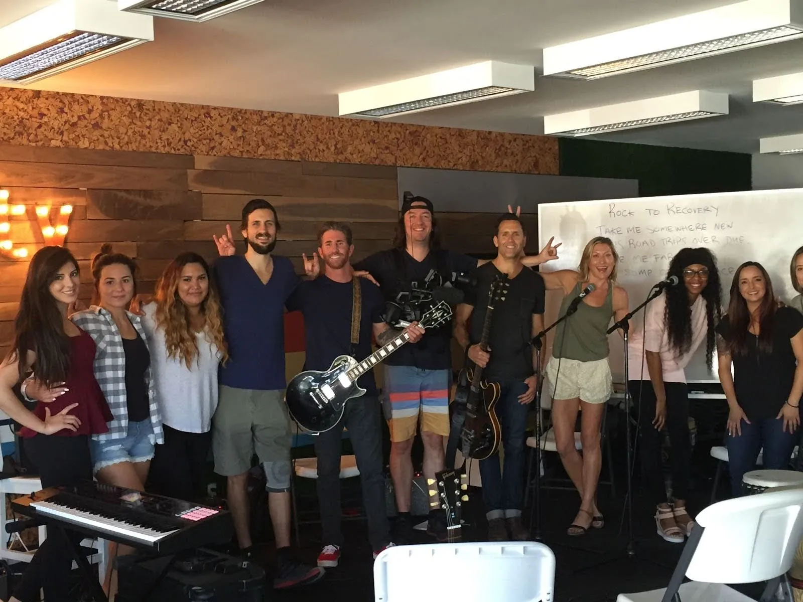 BandJAM group session — participants playing instruments together, guided by a JAM Master.